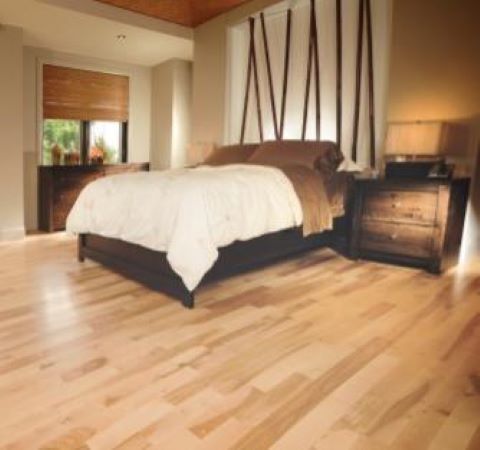 a hardwood floor bedroom